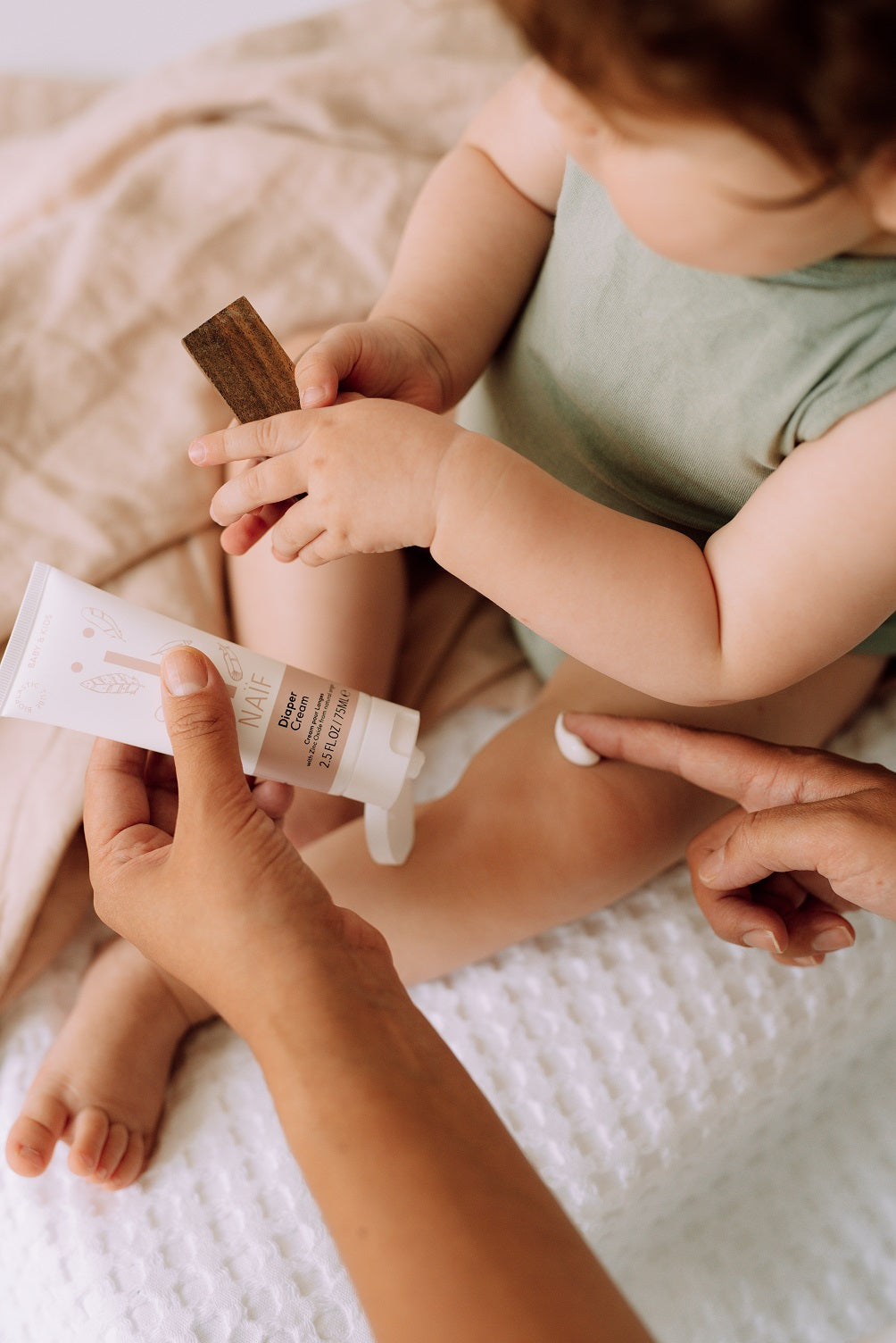 Naïf Baby & Kids kremas kūdikiams, skirtas sauskelnių sudirgintai visų tipų odai